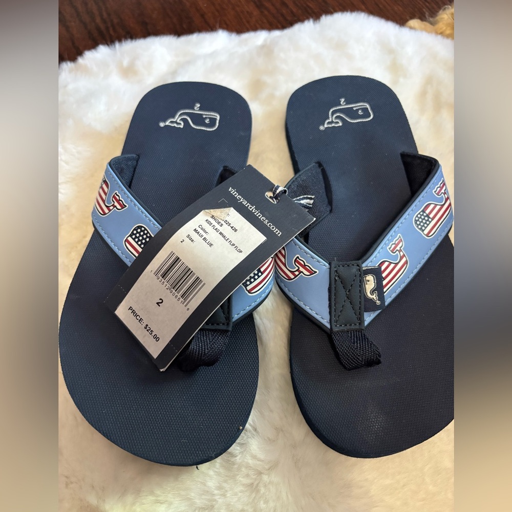 NWT. Vineyard Vines Navy Flip Flops with Whale Logo, size 2